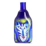A blue glass vase with tiger by 
																			Britten Paag