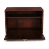 Wall unit of rosewood consisting of five back pieces three cabinets shelves shelves holders and side pieces by 
																			 Cado Co