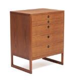 A teak chest of drawers five drawers in front with brass handles Model BM 59 by 
																			 P Lauritsen & Sons