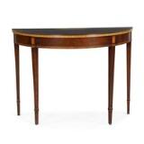 A 'demi lune' Regency style mahogany console table by 
																			 Hansen and Terp