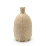 A bottle shaped stoneware vase by 
																			Patrick Nordstrom