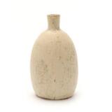 A bottle shaped stoneware vase by 
																			Patrick Nordstrom