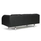 Freestanding three seater sofa mounted on round steel legs, Sides, back and loose cushions in seat and back upholstered with black leather by 
																			Jorgen Gammelgaad