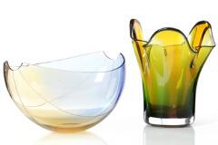 Unique bowl of yellow and blue tinted cut glass by 
																			Gunnar Cyren