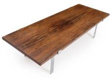 A rectangular rosewood coffee table with steel frame by 
																			Jorgen Hoj