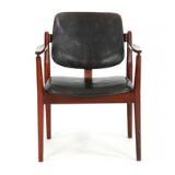 Armchair with rosewood frame by 
																			Borge Rammeskow