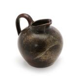 Stoneware pitcher decorated with grey and brown spotted glaze by 
																			Eva Staehr-Nielsen