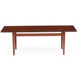 Rectangular coffee table of teak with reversible top with black formica on one side by 
																			Kai Lyngfeldt Larsen