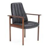 A Rosewood Armchair, Upholstered In Seat and Back With Black Leather by 
																			Sven Ivar Dysthe