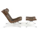 “Ari” Easy chair and matching stool by 
																			Arne Norell