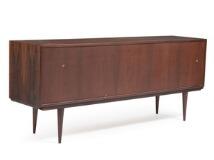 A rosewood sideboard, front with four drawers and two sliding doors by 
																			 Omann Jun Mobelfabrik