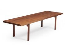 A rectangular solid teak coffee table with octagonal legs by 
																			Illum Wikkelso