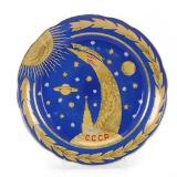 Porcelain dish decorated in yellow, red and gold on blue ground depicting the rocket launch of Luna 1, January 2, 1959 by 
																			 Dulevo Porcelain Works
