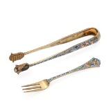 A Russian silvergilt and cloisonné enameled pair of tongues and a small fork by 
																			Feodor Ruckert