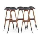 Five teak bar stools with metal legs by 
																			Erik Buck