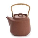 Unglazed earthenware teapot with patterned sides and cane handle by 
																			 Palshus