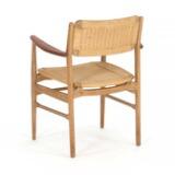 Armchair of oak with armrests of teak by 
																			Torben Strangaard