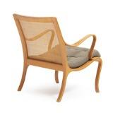 Vienna, A moulded and laminated beech armchair by 
																			Nils Rooth