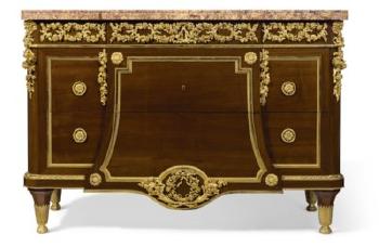 A French Ormolu-Mounted Mahogany Commode by 
																	Jean Henri Riesener