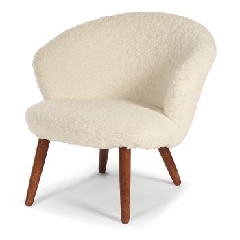 An Armchair by 
																	 Sattrup Furniture