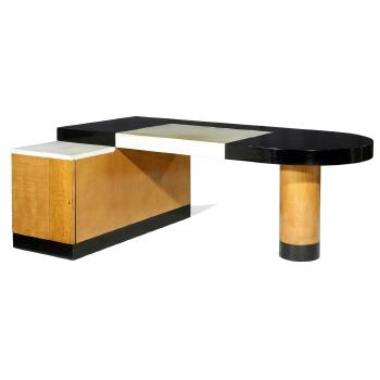 A Sycamore Veneer And Black Lacquered Wood Desk by 
																	Michel Duffet