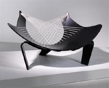 A Wing lounge chair by 
																	Peter Karpf