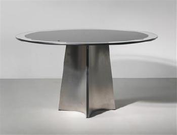 A circular table by 
																	Luigi Saccardo