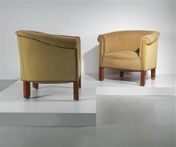 Two armchairs by 
																	Robert Oerley