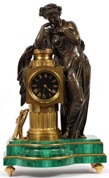 French malachite and bronze figural clock by 
																			 Japy Freres