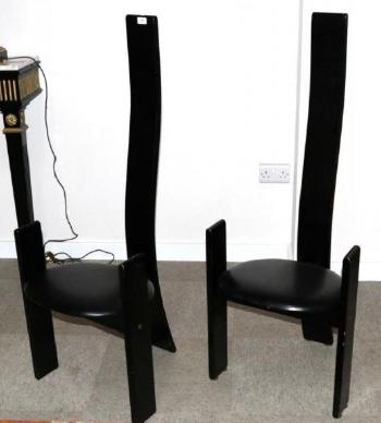 A Pair of Black Golem Chairs by 
																	Vico Magistretti