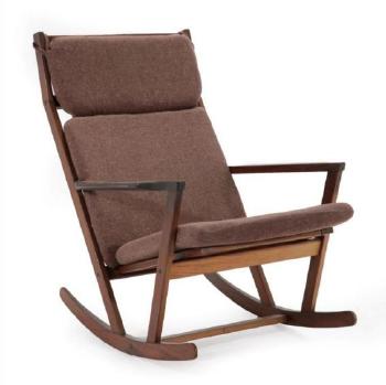 A Scandinavian 1960s Teak Framed Rocking Chair by 
																	Poul M Volther