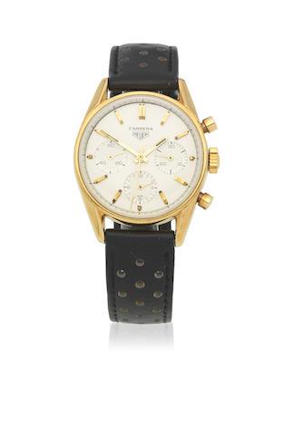 An 18K Gold Manual Wind Chronograph Wristwatch by 
																	 TAG Heuer