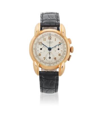 An 18K Rose Gold Manual Wind Chronograph Wristwatch With Oversized Lugs by 
																	 Universal Geneve
