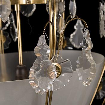 A late 1940s '70' chandelier for Stockmann Orno by 
																			 Stockmann Orno