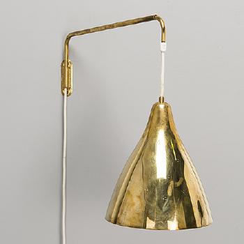 A mid 20th century wall light for Stockmann Orno, Finland by 
																			 Stockmann Orno