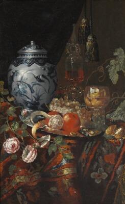 Still life with Dutch faience jar citrus fruit on a plate grapes roses goplet roemer and trimmings by 
																			Willem Kalf