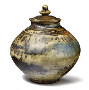 Stoneware lid jar decorated with Sung glaze with blue elements by 
																	Knud Andersen