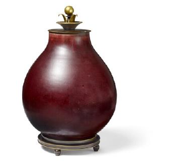Stoneware lid jar decorated with oxblood glaze by 
																	Carl Halier