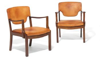 A pair of Cuban mahogany armchairs by 
																			Gustav Bertelsen