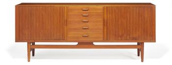 Teak sideboard front with five drawers and two tambour doors oak interior with pull-out trays and shelves by 
																			 Worts Mobler