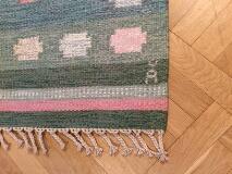 Bolmsö, Handwoven rölakan carpet of wool with pattern in shades of green with rose details by 
																			Anna-Johanna Angstrom