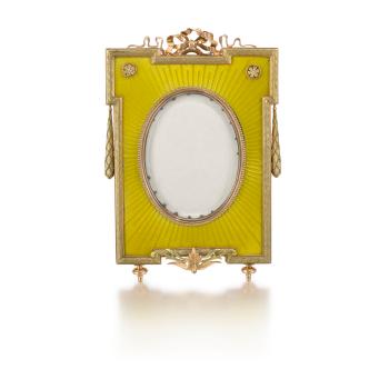 A Fabergé gold, silver-gilt, and guilloché enamel photograph frame, workmaster Johan Viktor Aarne, St. Petersburg by 
																	Johan Victor Aarne