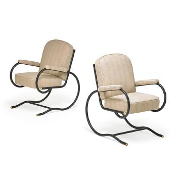 Pair of lounge chairs by 
																			Baptistin Spade