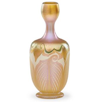 Vase with swirling pattern by 
																			 Quezal Glass