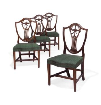 The Herreshoff family set of four federal carved mahogany side chairs by 
																	 John Carlile & Sons