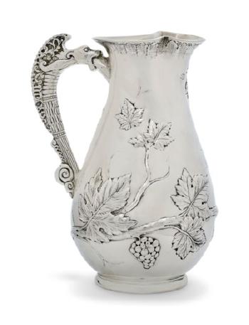 An American silver pitcher by 
																	 Samuel Kirk & Son
