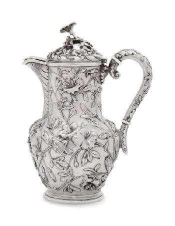 An American silver coffee pot by 
																	 Samuel Kirk & Son