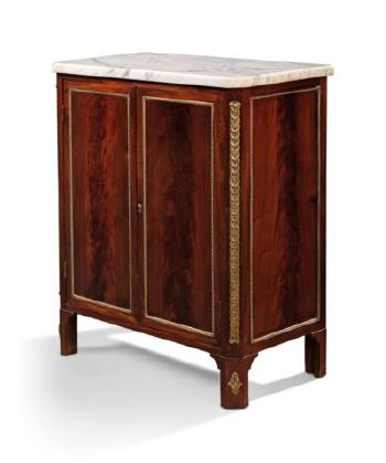 A French Brass-mounted Mahogany Side Cabinet by 
																	 Maison Jansen