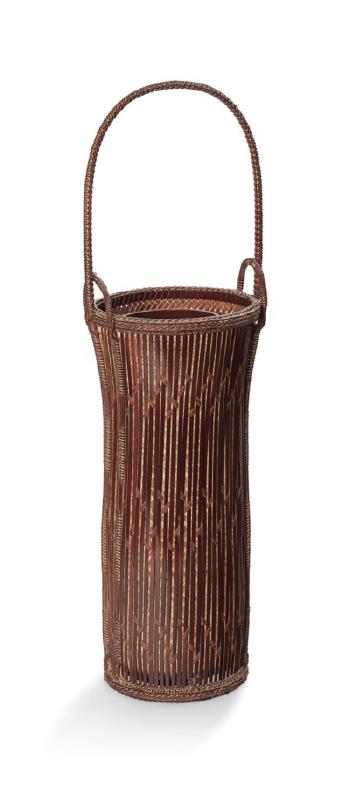 A bamboo basket for flower arrangement by 
																	Rokansai Iizuka