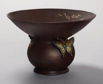 A soft-metal-inlaid iron vase by 
																	Shoami Katsuyoshi